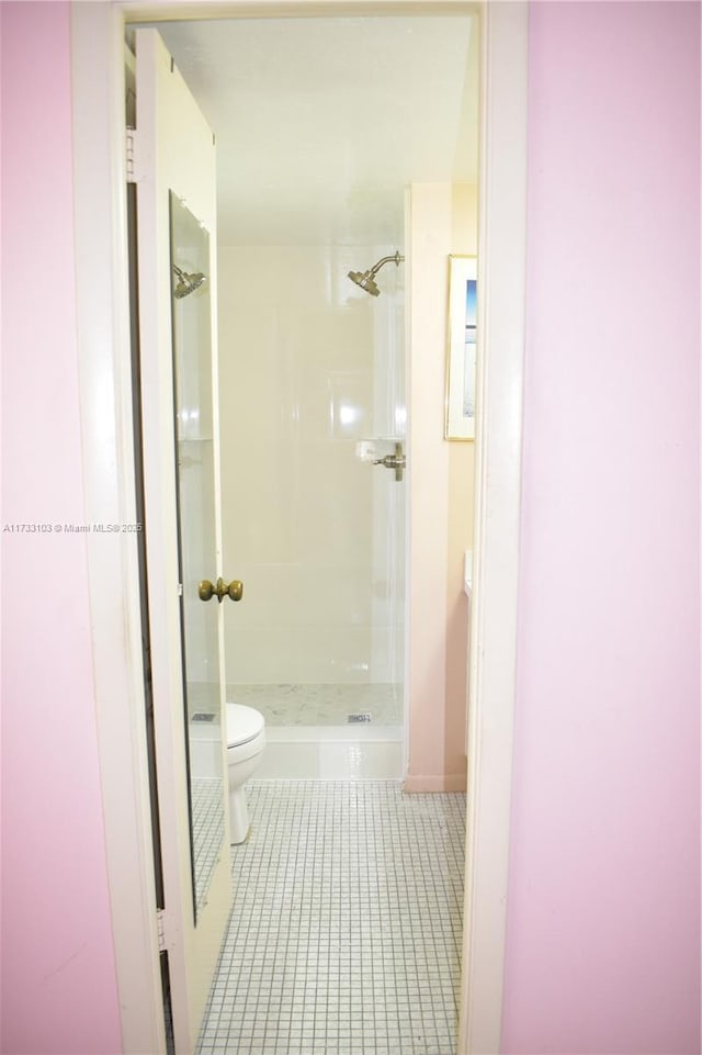 9360 Sunrise Lakes Blvd Unit 112, Sunrise, FL 33322 - bathroom featuring a shower stall and tile patterned floors