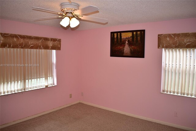9360 Sunrise Lakes Blvd Unit 112, Sunrise, FL 33322 - spare room with carpet flooring, ceiling fan, and a textured ceiling