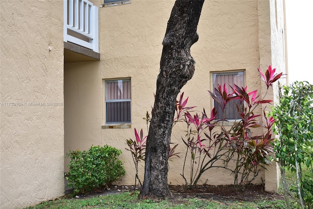 9360 Sunrise Lakes Blvd Unit 112, Sunrise, FL 33322 - view of side of home featuring stucco siding