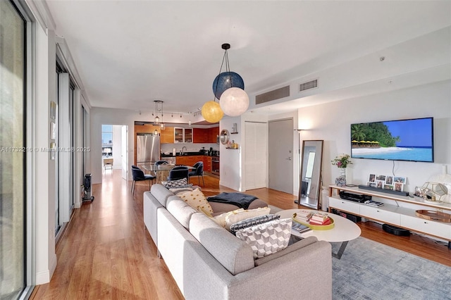 living room featuring light hardwood / wood-style floors