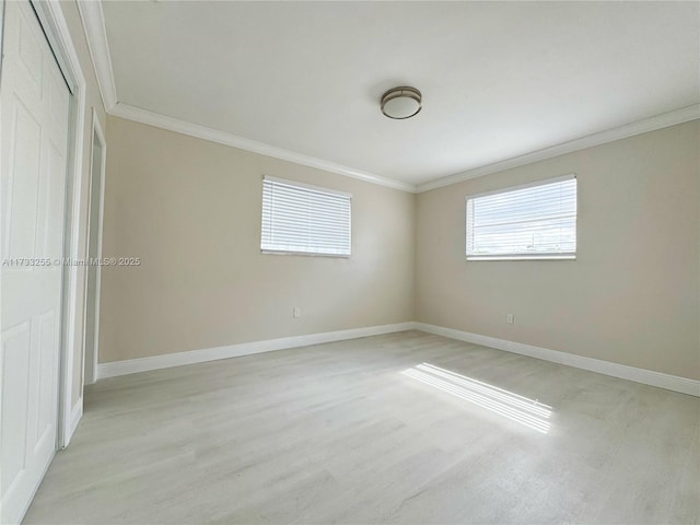 spare room featuring ornamental molding