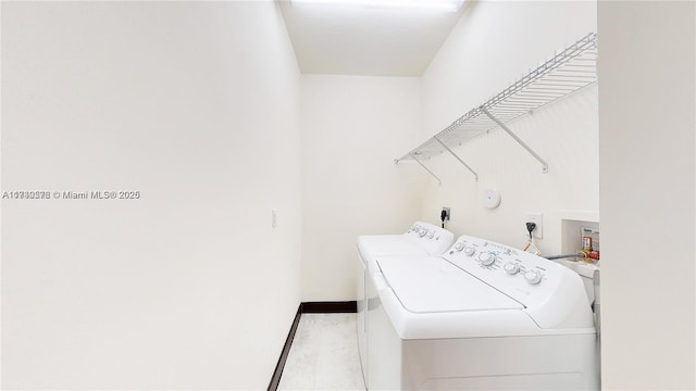 laundry room featuring independent washer and dryer