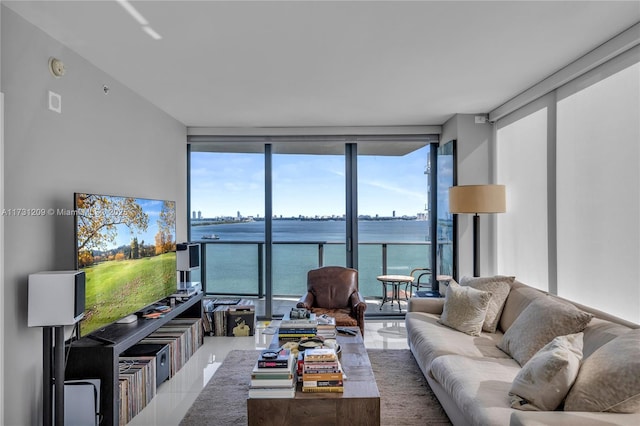 living room featuring floor to ceiling windows