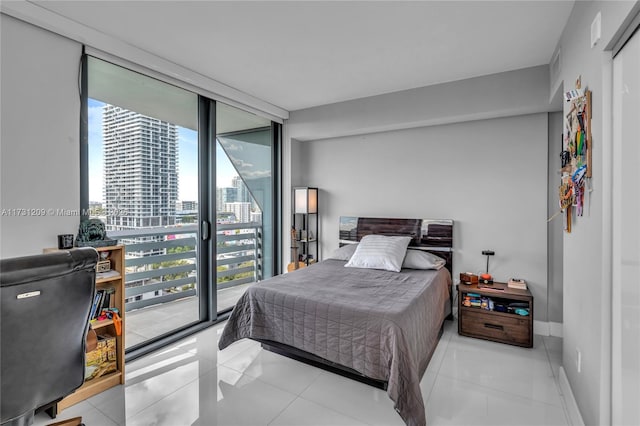 tiled bedroom featuring floor to ceiling windows and access to outside