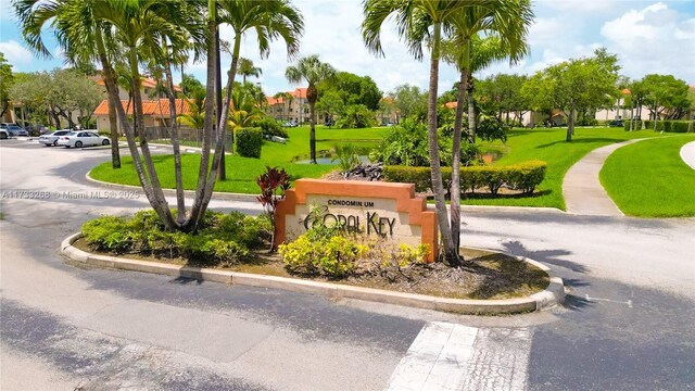 surrounding community featuring a lawn