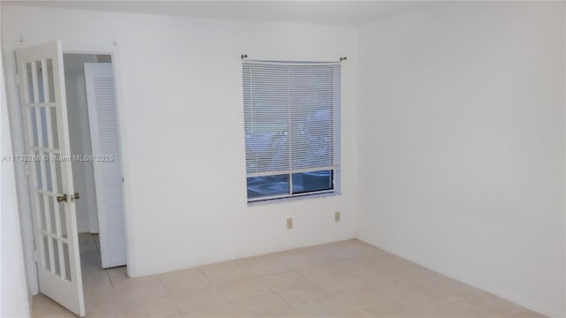 3360 N Pinewalk Dr N Unit 1315, Margate, FL 33063 - spare room featuring light tile patterned flooring