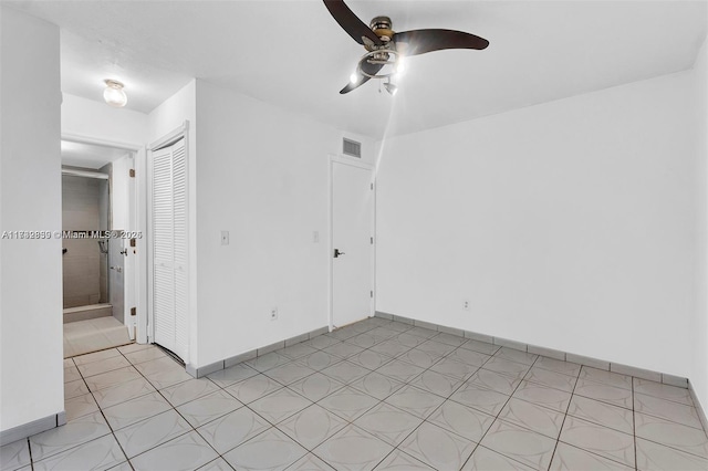 spare room featuring ceiling fan