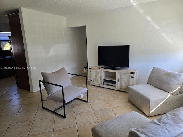 tiled living room with a textured ceiling