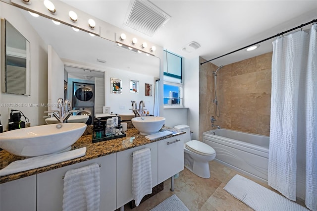 full bathroom with vanity, toilet, and shower / bath combo