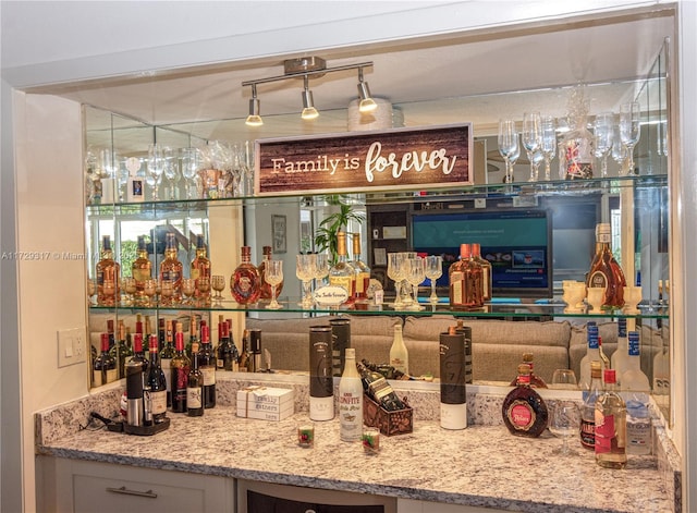 bar with light stone countertops