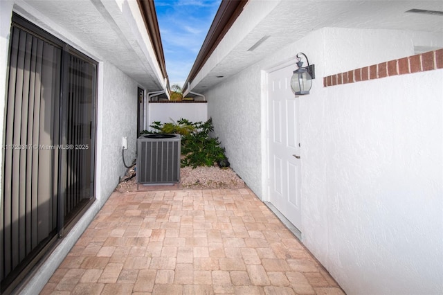 view of patio featuring central AC