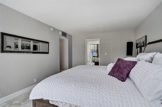 bedroom with a textured ceiling