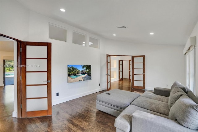 living room with dark hardwood / wood-style floors