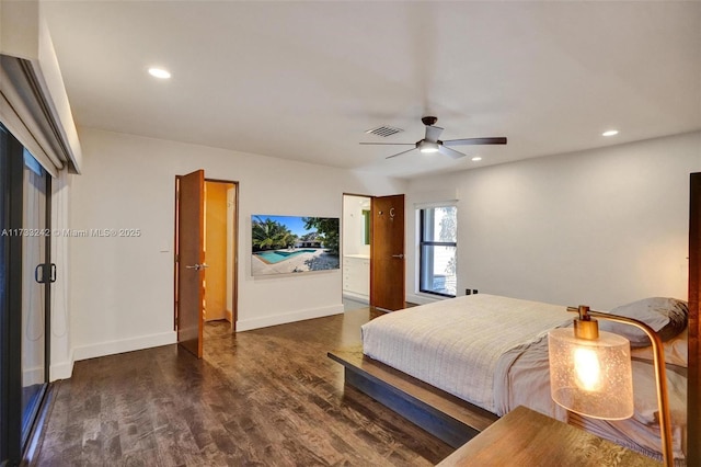 bedroom featuring ceiling fan and dark hardwood / wood-style flooring