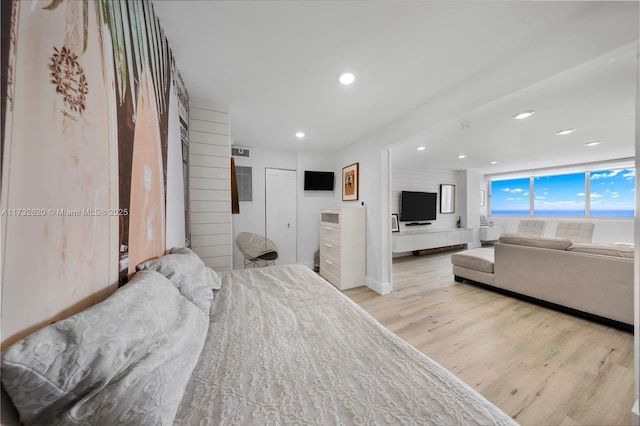 bedroom featuring light wood-type flooring