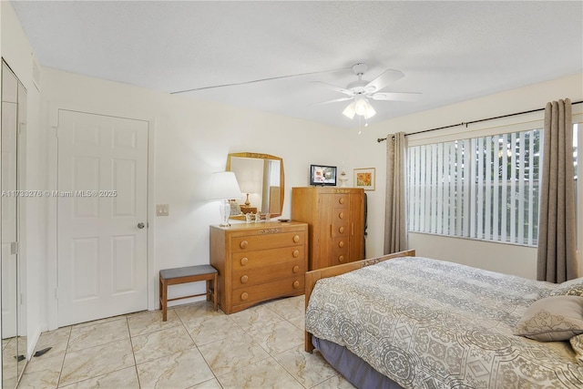 bedroom featuring ceiling fan