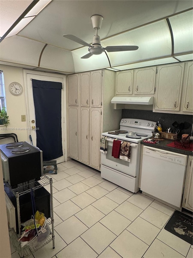 kitchen featuring ceiling fan, white appliances, and light tile patterned floors