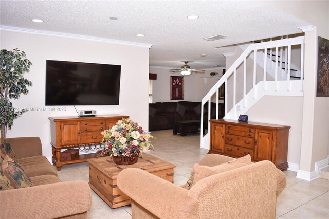 kitchen with stainless steel refrigerator, light brown cabinetry, kitchen peninsula, and sink