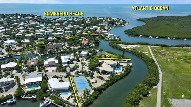 bird's eye view with a residential view and a water view