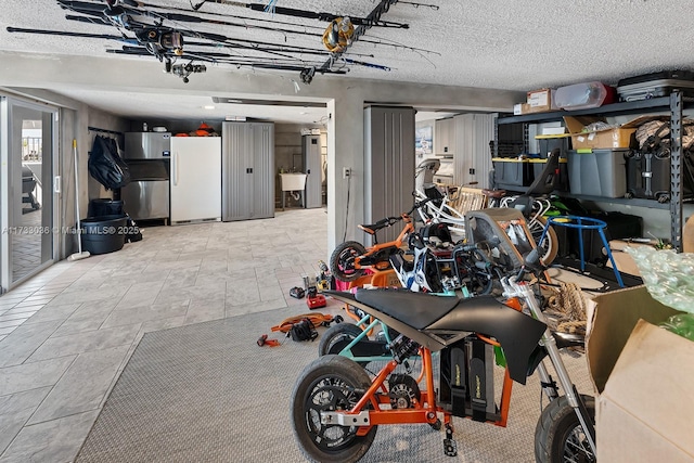 garage featuring freestanding refrigerator