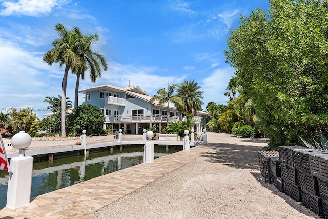 dock area with a water view