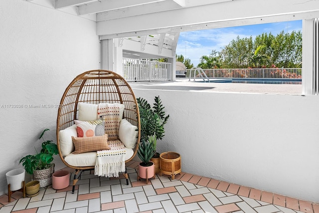 view of patio / terrace featuring fence