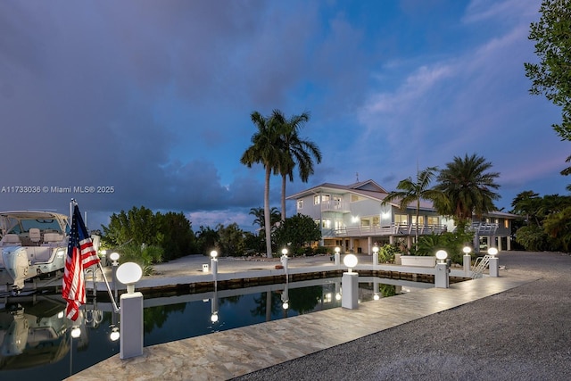 view of pool featuring a boat dock