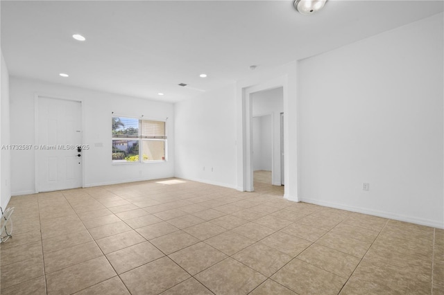 view of tiled spare room