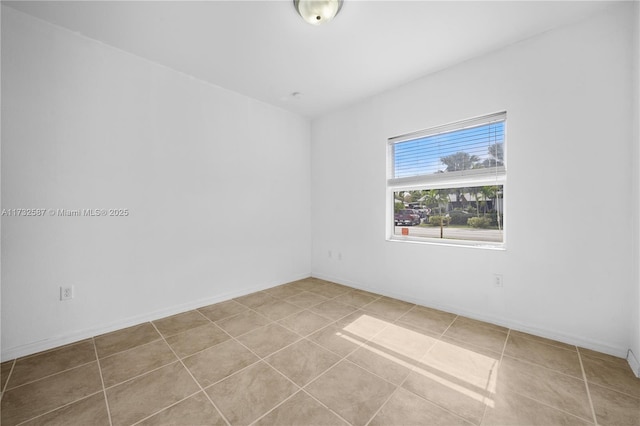 view of tiled spare room