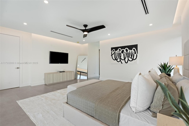 bedroom featuring ceiling fan and concrete floors