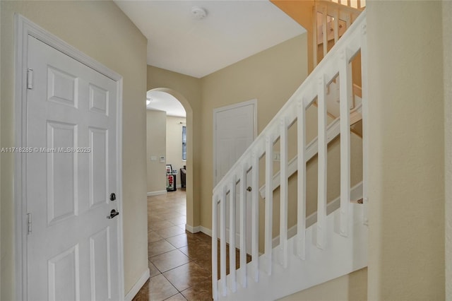 foyer entrance featuring tile patterned floors