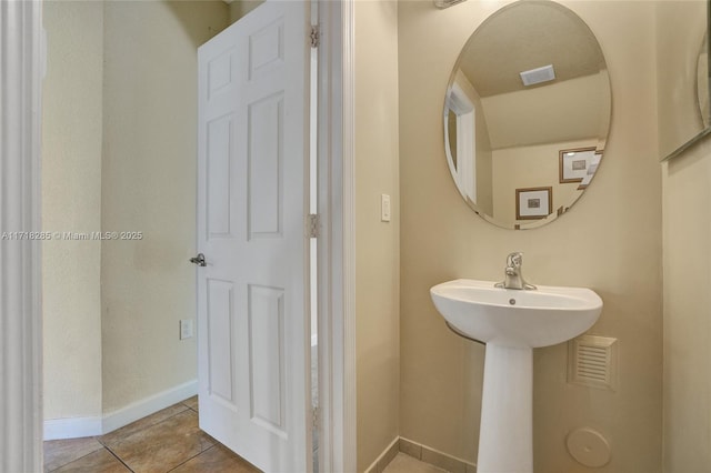 bathroom featuring sink and tile patterned floors