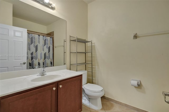 bathroom with walk in shower, tile patterned floors, toilet, and vanity