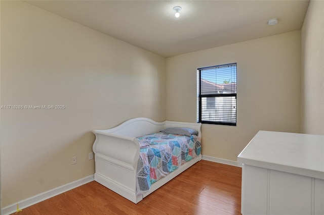 bedroom featuring light wood-type flooring