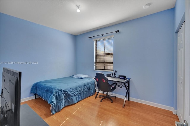 bedroom featuring hardwood / wood-style floors