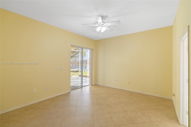 empty room with light tile patterned flooring and ceiling fan