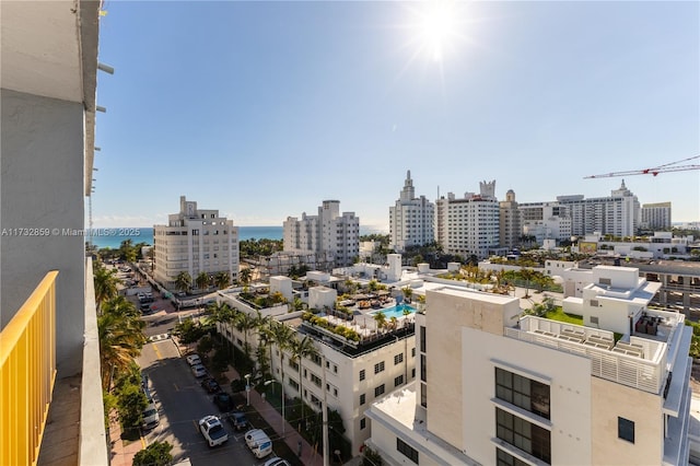 property's view of city featuring a water view