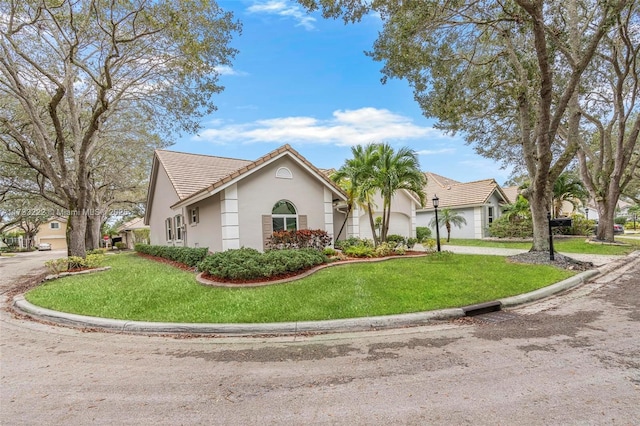 view of front of home with a front lawn