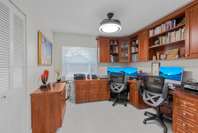 office space featuring a textured ceiling