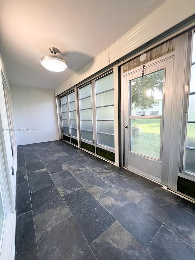 interior space featuring stone finish flooring