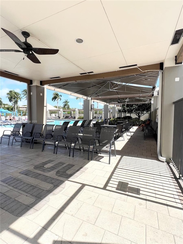 view of patio with ceiling fan