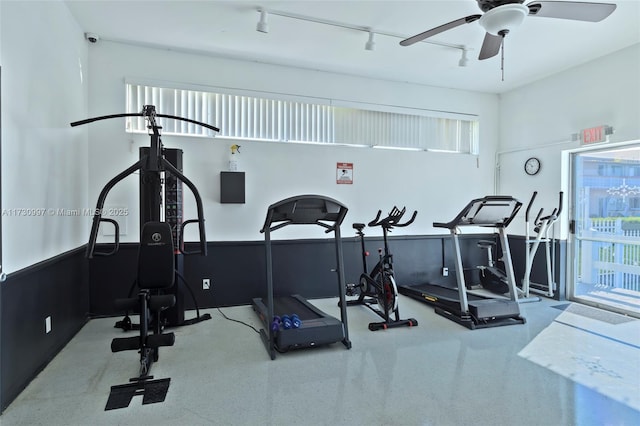 interior space featuring ceiling fan