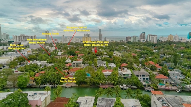 aerial view with a water view and a view of city