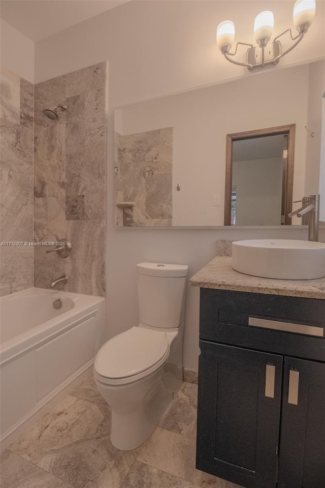 full bath featuring shower / bathtub combination, marble finish floor, vanity, and toilet