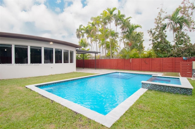 view of pool with a fenced backyard, a pool with connected hot tub, a lawn, and a patio