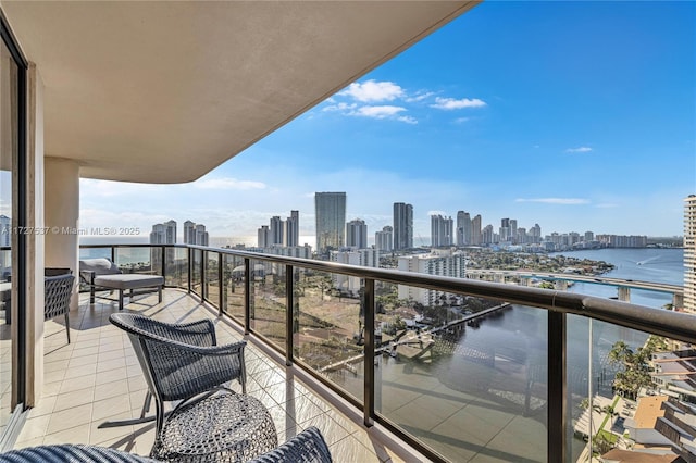 balcony featuring a water view