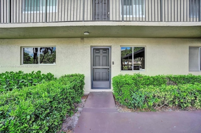 property entrance with a balcony