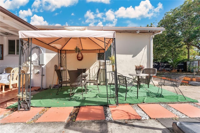 view of patio featuring a gazebo