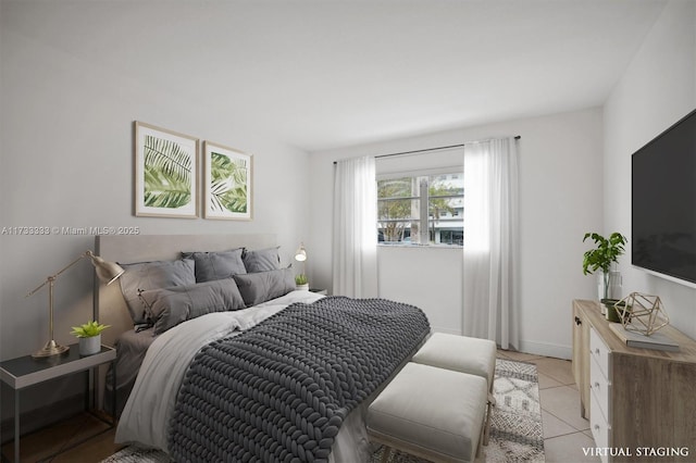 bedroom featuring light tile patterned flooring