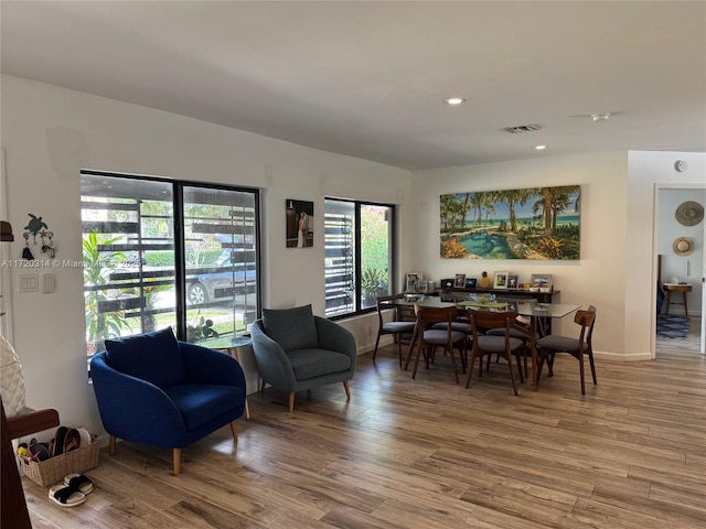 dining space featuring light hardwood / wood-style flooring